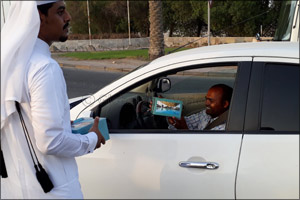 Sealine Beach Resort volunteers distribute  iftar for motorists in Mesaieed and Al Wakrah